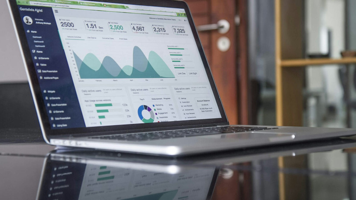 Laptop showing SEO analytics dashboard for a Shopify store