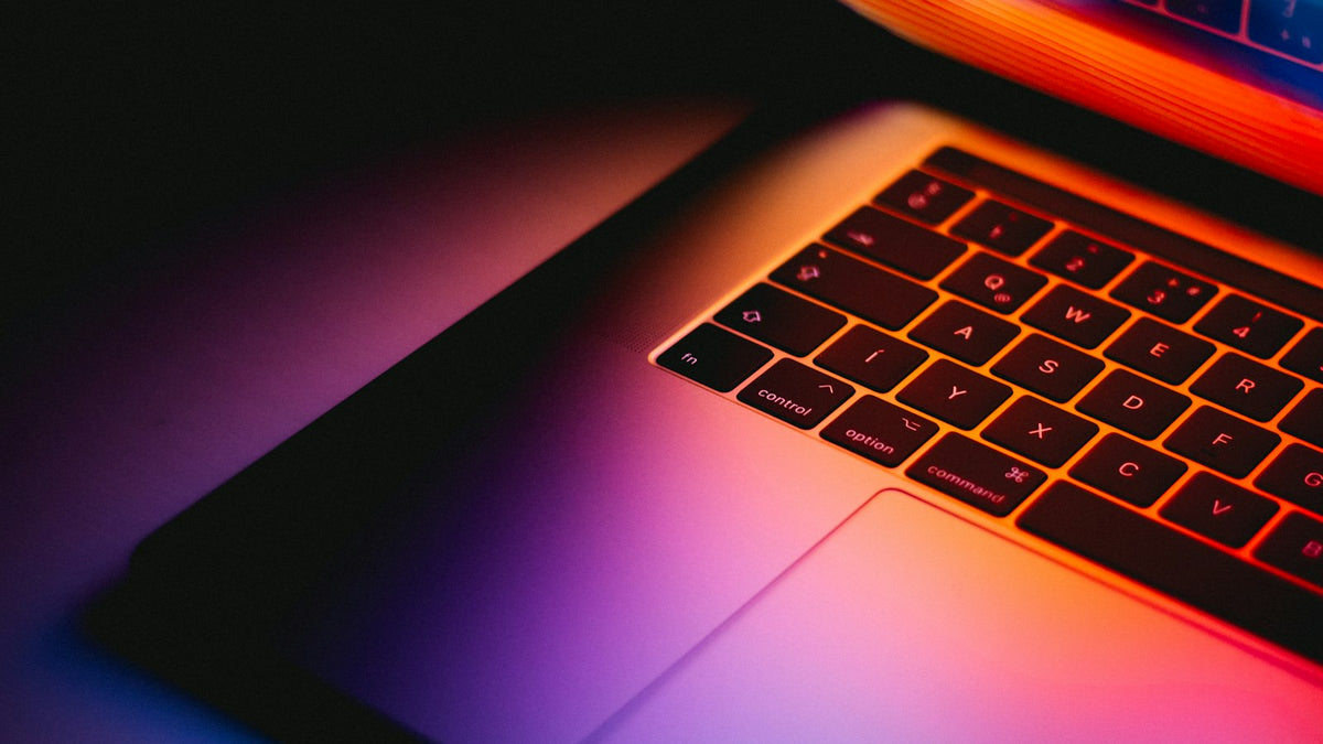 Laptop turned on and ready to launch a new Shopify store