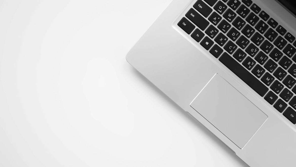 Laptop on a clean desk used for planning a content calendar