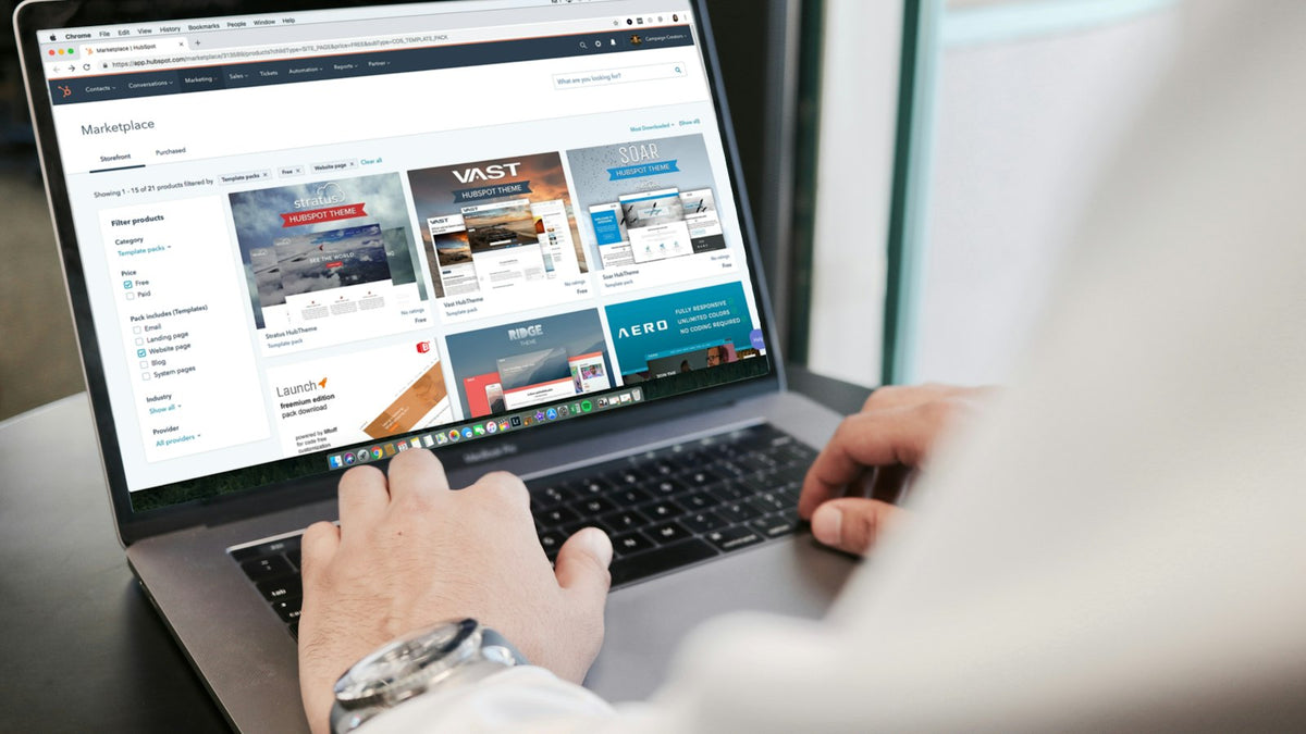 Person writing an SEO blog post on a laptop
