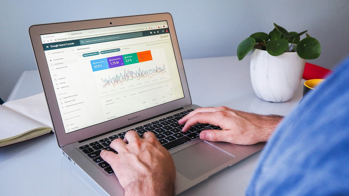 Professional working on a service business website on a laptop