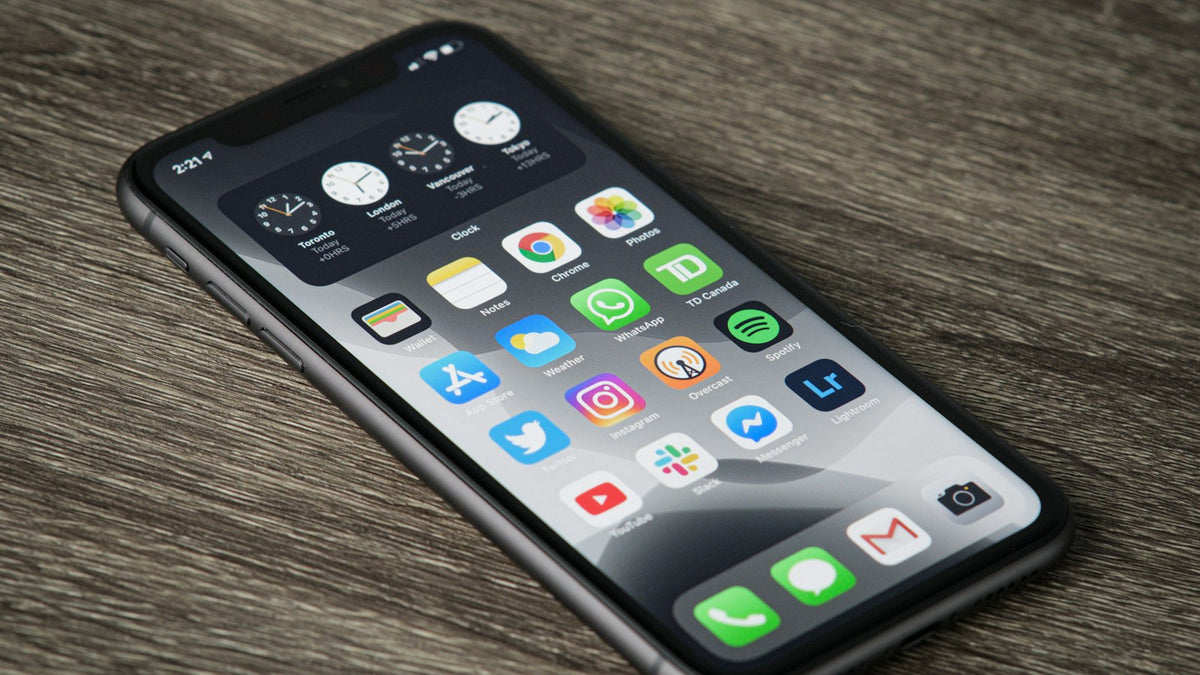 Smartphone home screen with apps used for email marketing