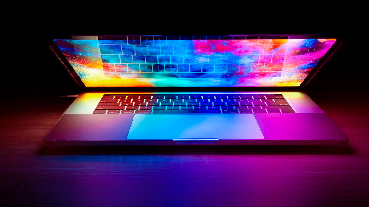 Laptop with a colourful screen representing a fresh website redesign