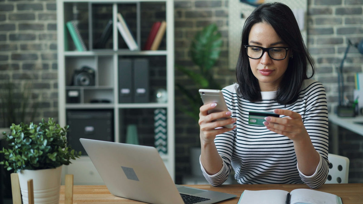Woman browsing a D2C brand's online store on her phone