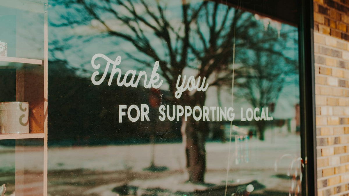Thank you for supporting local sign on a shop window